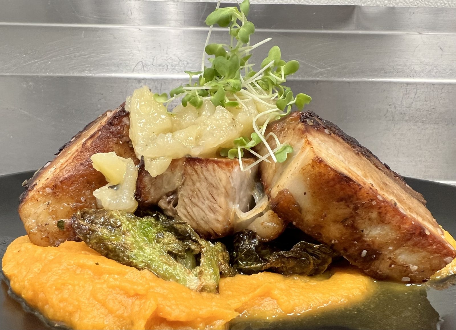 Crispy pork belly with apple cider glaze, by Chef Tony Durso